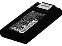Black HP 693716-001 power adapter with a textured surface, featuring a label with technical specifications and a blue LED indicator.