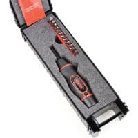 Black and red Norbar torque screwdriver kit with 1/4 inch hex bits in a black foam-lined case.