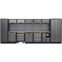 Sealey Superline Pro storage system with wood worktop, grey cabinets, drawers, and pegboard backing, 4.9 meters wide.