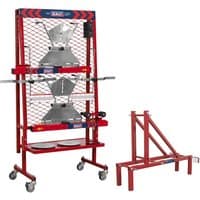 Red Sealey GA70 four-wheel laser aligner with metal frame, mesh backing, and adjustable components on wheels.
