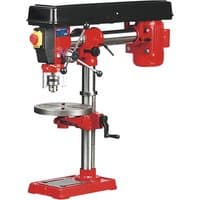 Red and silver Sealey 5-speed radial bench pillar drill with adjustable table and black motor housing.