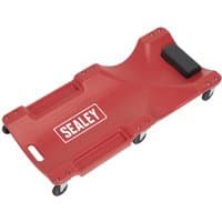 Red Sealey SCR80 creeper with six wheels, ergonomic shape, and integrated headrest.