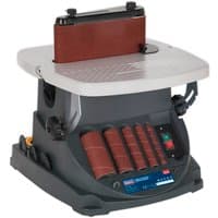 Sealey SM1300 sander with gray base, red belt, spindle attachments, and control panel on the front.