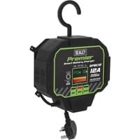 Sealey SPBC12 black battery charger with digital display, green accents, and UK plug, featuring a hanging hook.