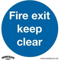 Blue circular Sealey safety sign with white text "Fire exit keep clear," self-adhesive vinyl material.