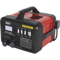 Black and red Sealey SUPERBOOST starter charger with handle, analog display, and multiple switches on the front panel.