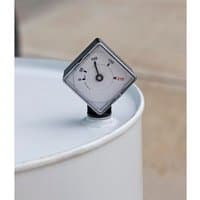 "Square Sealey TP129 oil drum level indicator with white dial, black needle, and black casing on a white drum"