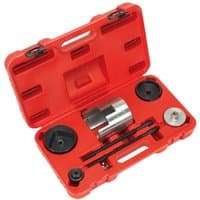 Red Sealey trailing arm bush tool kit with metal components in a molded case for Vauxhall and Opel vehicles.