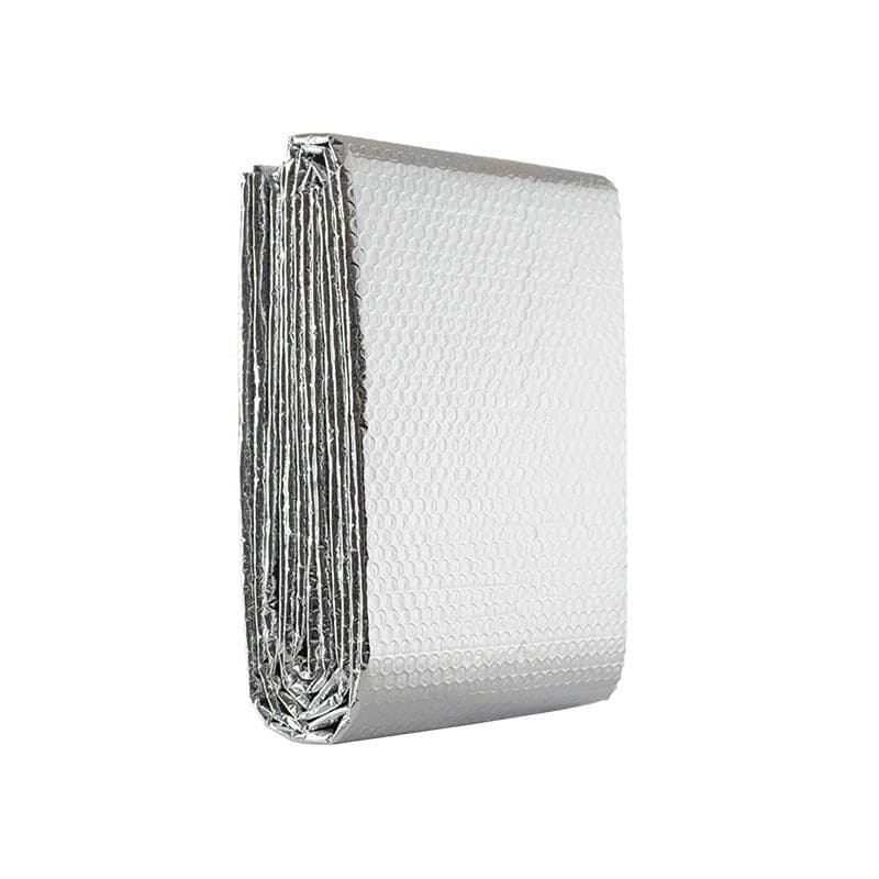 Silver radiator insulation pack with a textured, honeycomb pattern, compactly folded for easy storage, designed to enhance energy efficiency.