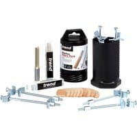 "Trend 18 Piece Kitchen Router Fitters Pack with router bits, biscuits, and clamps in black and silver packaging"