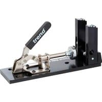 Black Trend Pocket Hole Jig with adjustable clamp, metal handle, and dual drill guides on a rectangular base.