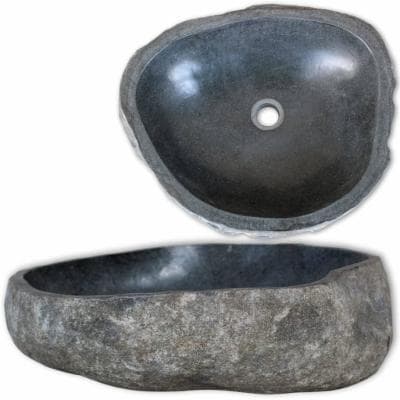 Oval basin made from natural river stone, featuring a smooth dark gray interior and a rugged, textured exterior, with a central drain hole.