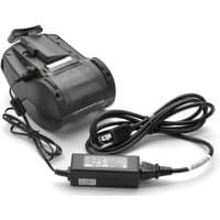 Black Zebra power adapter with attached cable, compact rectangular design, and label on the side.