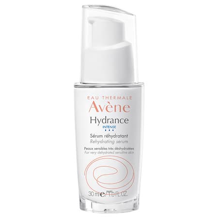 Clear glass bottle with a white pump dispenser, labeled "Avene Hydrance Intense Rehydrating Serum," featuring a minimalist design and a capacity of 30 ml.