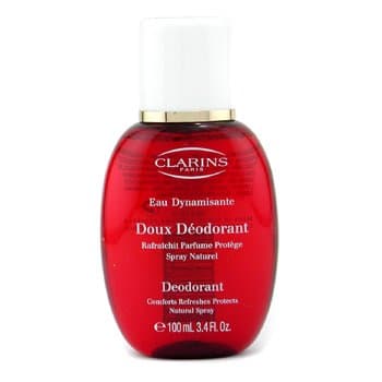 Red glass spray bottle with a white spray nozzle, labeled "Clarins Eau Dynamisante Doux Déodorant" in white text, 100 ml capacity, featuring a sleek, rounded design.