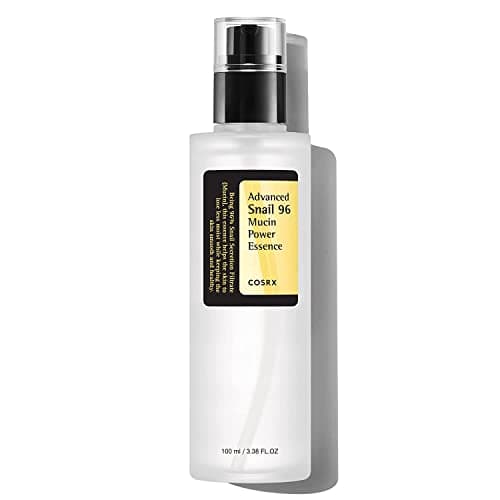 Clear plastic bottle with a black pump top, labeled "Advanced Snail 96 Mucin Power Essence 100ml" featuring a yellow and black design, emphasizing skin repair and hydration.