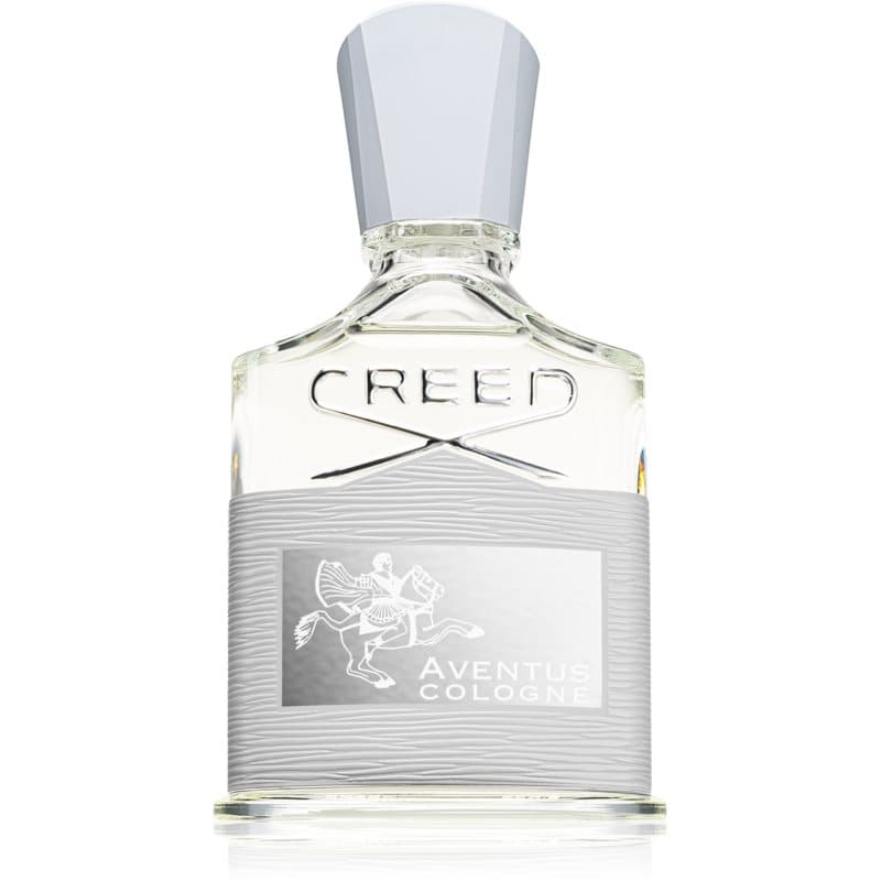 Clear glass bottle of Creed Aventus Cologne Eau De Parfum featuring a textured silver label and a light gray cap, showcasing an elegant and sophisticated design.