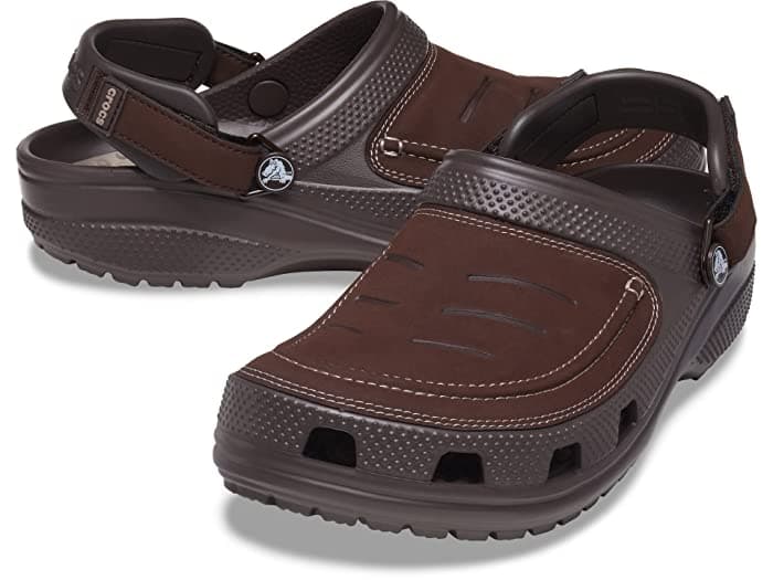 Brown and mushroom-colored Crocs Classic Yukon Vista II LiteRide™ clogs featuring a slip-on design, adjustable back strap, and perforated sides for ventilation.