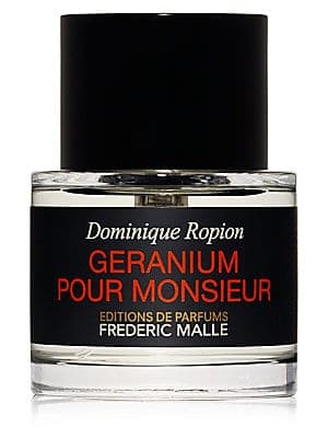Clear glass bottle with a black cap, featuring a label that reads "Geranium Pour Monsieur" in bold red and white text, designed by Frederic Malle.