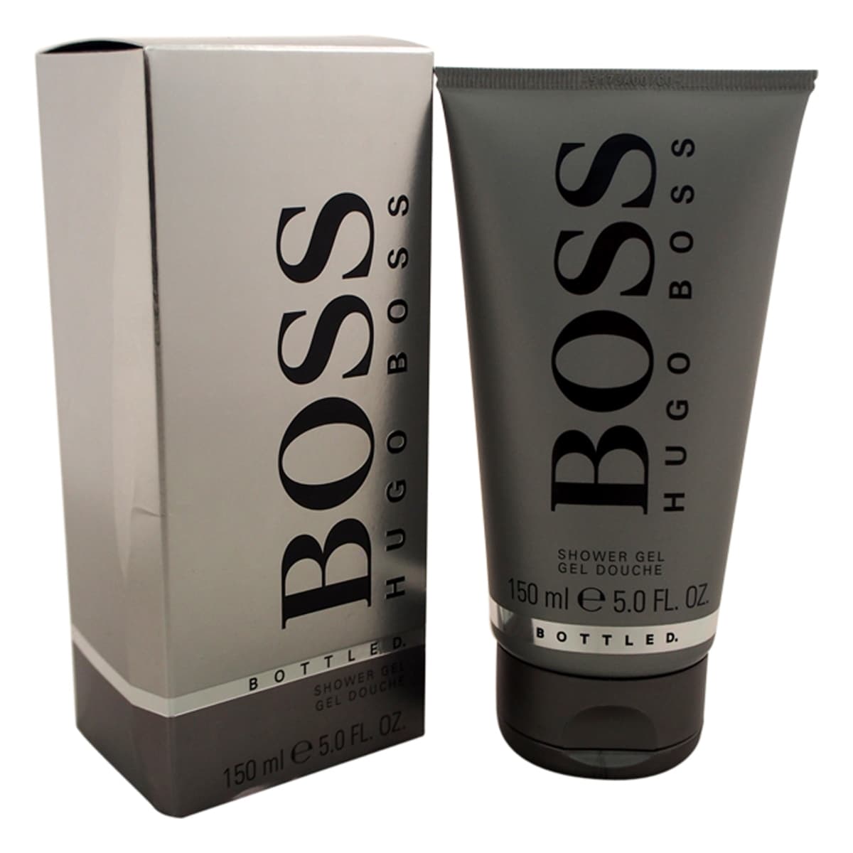 Gray tube of Boss #6 shower gel by Hugo Boss, featuring bold black lettering, placed beside a sleek silver box, both highlighting a modern, elegant design.