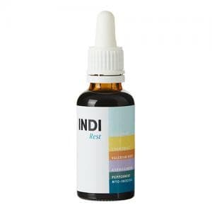 Brown glass dropper bottle labeled "INDI Rest," featuring a white cap and a colorful gradient design with shades of blue, purple, and yellow, containing 30ml of supplement.