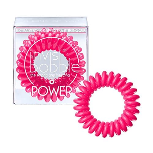 Three pink Invisibobble Power hair bands in a clear box, featuring a spiral design for extra grip and hold, ideal for securing hair without damage.