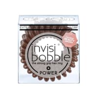 Three brown hair ties in a clear box, featuring a spiral design for a strong grip, labeled "Power" and "the strong grip hair ring" by Invisibobble.