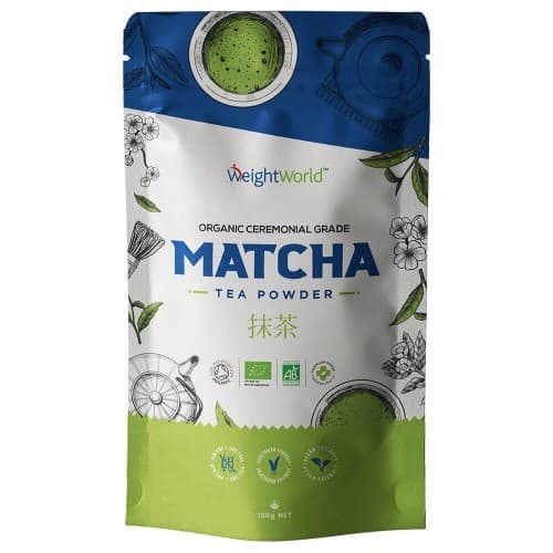 Green and blue packaging featuring "MATCHA TEA POWDER" in bold letters, with organic certification logos and illustrations of tea utensils, indicating 100g of 100% organic matcha.
