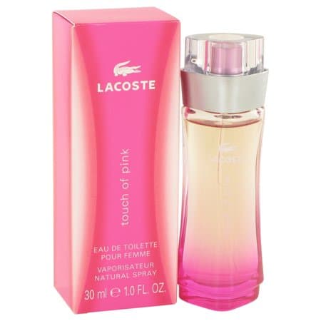 Lacoste Touch of Pink Eau De Toilette in a gradient pink bottle with a clear cap, accompanied by a matching pink box featuring the Lacoste logo.