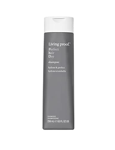Gray bottle of Living Proof Perfect Hair Day Shampoo, 8 oz, featuring a white flip-top cap and minimalist label with product name and details in white text.