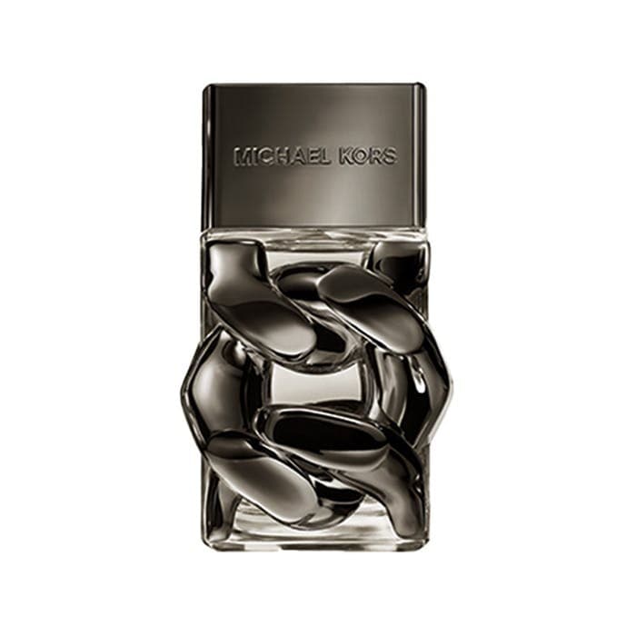 Clear glass bottle with a sleek design, featuring a dark chain motif around the neck and a metallic silver cap, labeled "MICHAEL KORS" on the front.