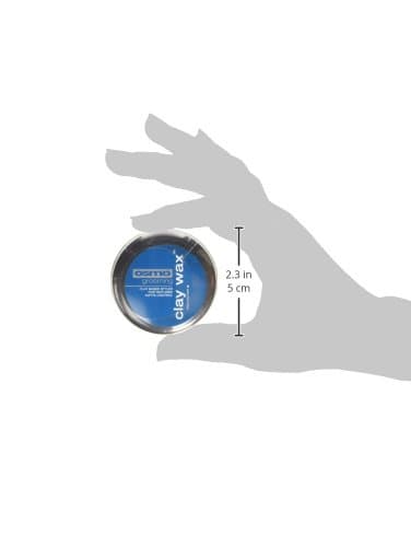 Osmo Clay Wax in a 25ml tin, featuring a blue label with white text, held in a hand to show size, with a sleek metal finish and a compact design.