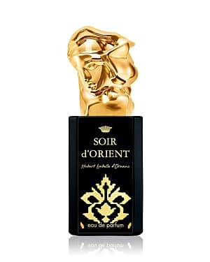 A luxurious black perfume bottle with a gold sculptural cap, featuring elegant curves and a floral design, labeled "Soir d'Orient" in gold lettering.