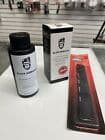 Slick Gorilla Hair Styling Powder in a black container with a white label, alongside a sleek black comb in red packaging, both displayed on a white surface.