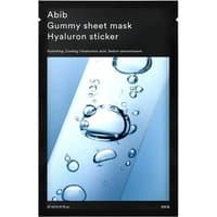 Black Abib sheet mask packet with water droplets design, labeled "Gummy Sheet Mask Hyaluron Sticker 27 ml."