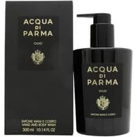 Black Acqua Di Parma Oud hand and body wash bottle with pump, gold text, and matching box, 300ml.