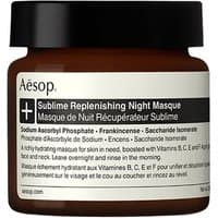 Amber jar of Aesop Sublime Replenishing Night Masque, 60 ml, with black screw cap and white label detailing ingredients.