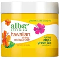 Alba Botanica oil-free moisturizer in white jar with yellow lid, featuring aloe and green tea, floral design on label.