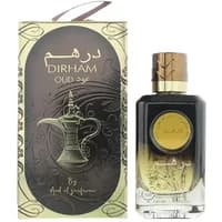 Dirham Oud perfume bottle, black and gold gradient with gold cap, next to ornate box with Arabic script.