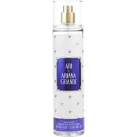 Clear bottle of Ariana Grande ARI Body Mist 236ml with gold spray nozzle and purple label featuring white text.