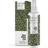 White bottle of Australian Bodycare Tea Tree Hair Loss Serum with green leaf pattern and spray nozzle, 250ml.