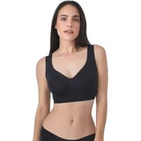 Black Sassa Bonded Micro bustier with wide straps and seamless design, worn by a model with long dark hair.