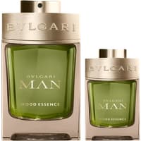 Bvlgari Man Wood Essence Gift Set with green glass bottles, gold caps, and Bvlgari branding, includes 100ml and 15ml EDP.