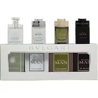 Bvlgari men's fragrance set with four mini bottles in varying colors, displayed in a sleek white box.