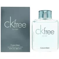 Clear glass bottle with silver cap, labeled "ck free" by Calvin Klein, next to a dark gray box.