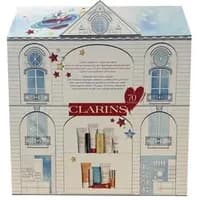 Clarins 12 Day Advent Calendar, house-shaped box with windows, stars, and skincare products visible inside.