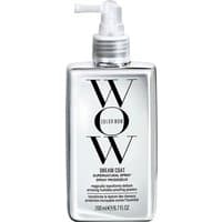 Clear rectangular bottle of Color Wow Dream Coat Supernatural Spray with pump nozzle and bold black text.