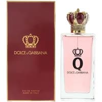 Clear glass bottle of Dolce & Gabbana Q Eau De Parfum, 100ml, with pink liquid and gold crown cap, next to red box.