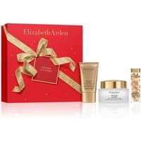 Red Elizabeth Arden gift box with gold ribbon, includes cream jar, tube, and capsule bottle.