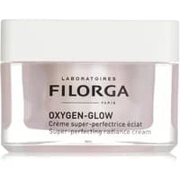 Filorga Oxygen Glow Cream in a clear jar with a white lid, featuring black text and a pinkish cream inside.